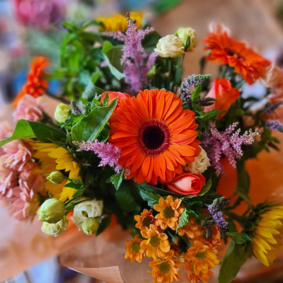Sunny Gerbera Bouquet - A cheerful bouquet featuring bright orange and yellow Gerbera daisies, perfect for brightening up any day. Florist Choice colours and flowers.