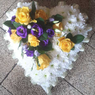Heartfelt Sympathy Arrangement - A heart-shaped arrangement with white chrysanthemums, yellow roses, and purple lisianthus, perfect for expressing heartfelt condolences.
